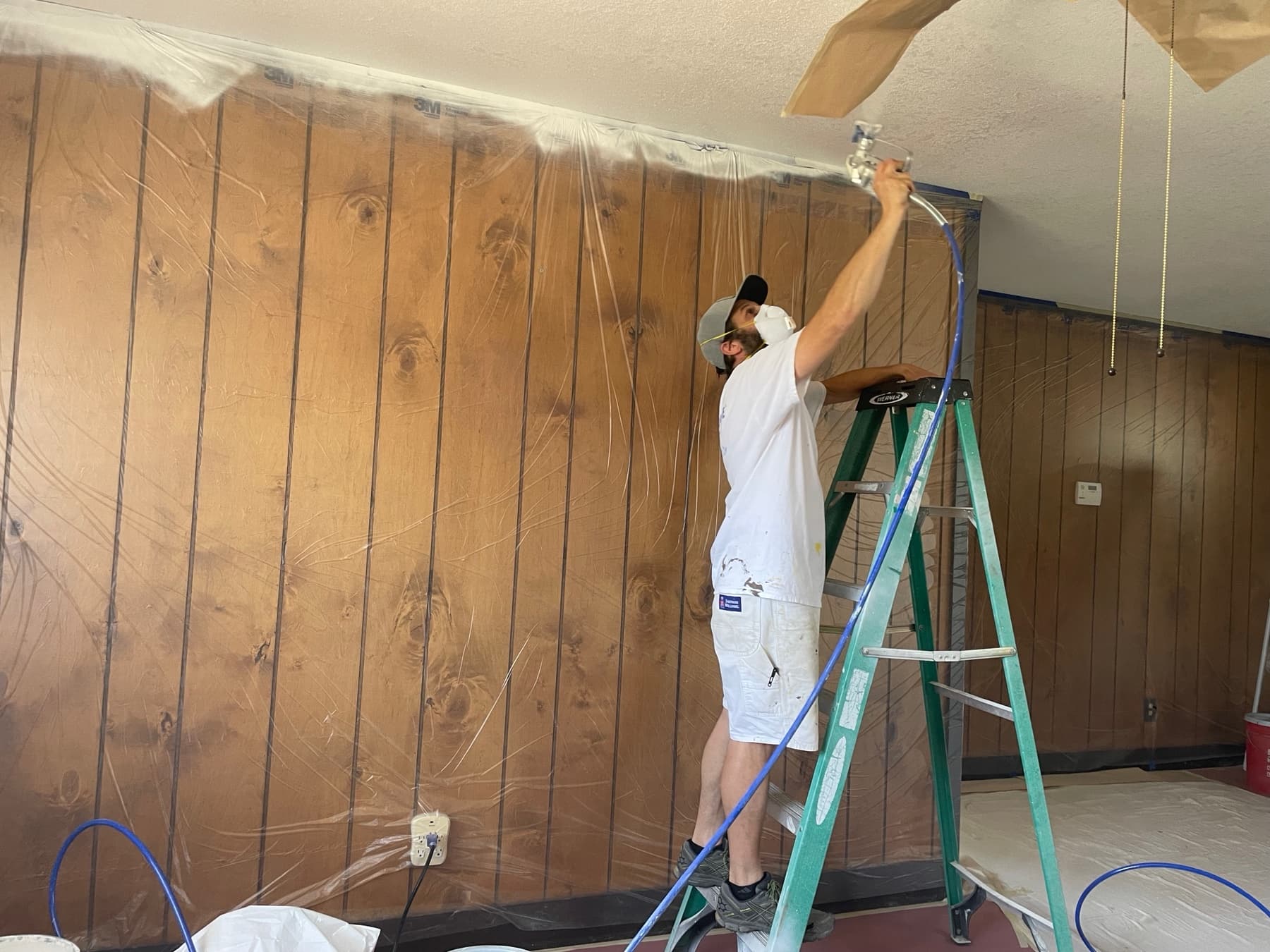 Interior repaint-wood walls preserved