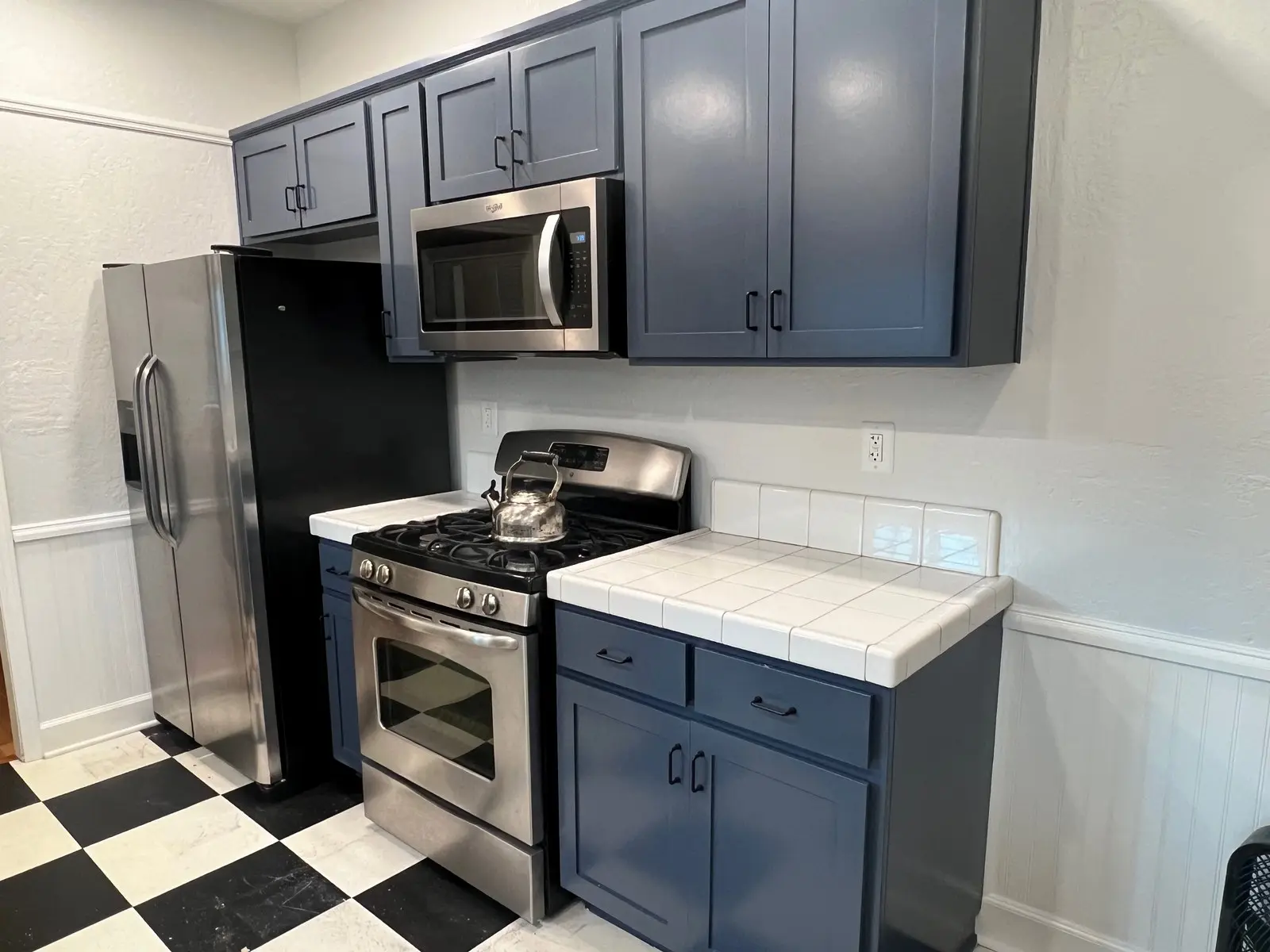 Gray-to-Navy Kitchen Cabinets after